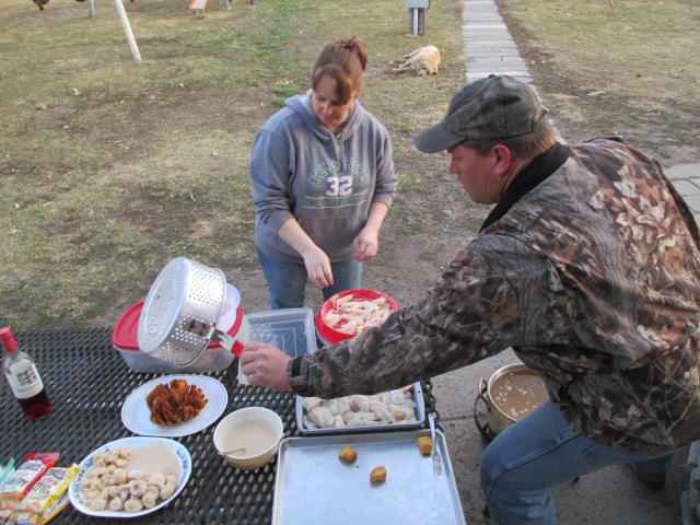 Angela and Don cooking up fish fried onions, mushrooms and cauliflower.  Delicious!